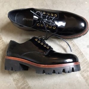 Black platform oxfords by Jeffrey Campbell